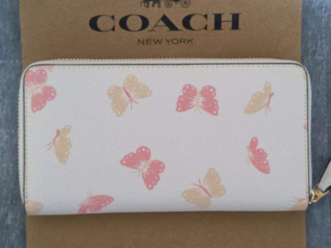 COACH 正規アウトレット品 レディース長財布 ホワイト/クリーム 蝶々柄
