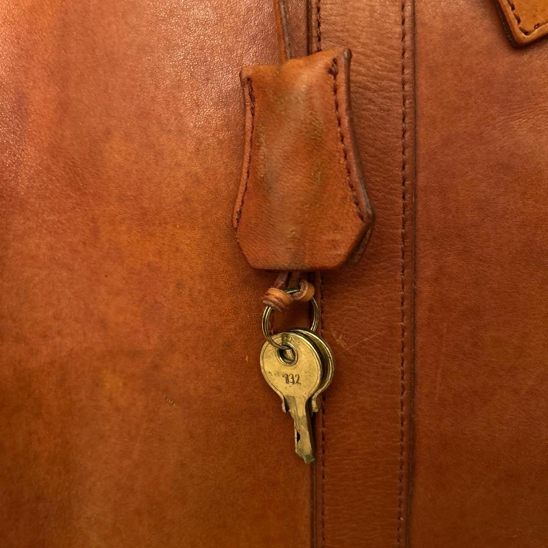 ヌメ革 ボストンバッグ 錠前・鍵付き 肩掛けベルト付き ヴィンテージ