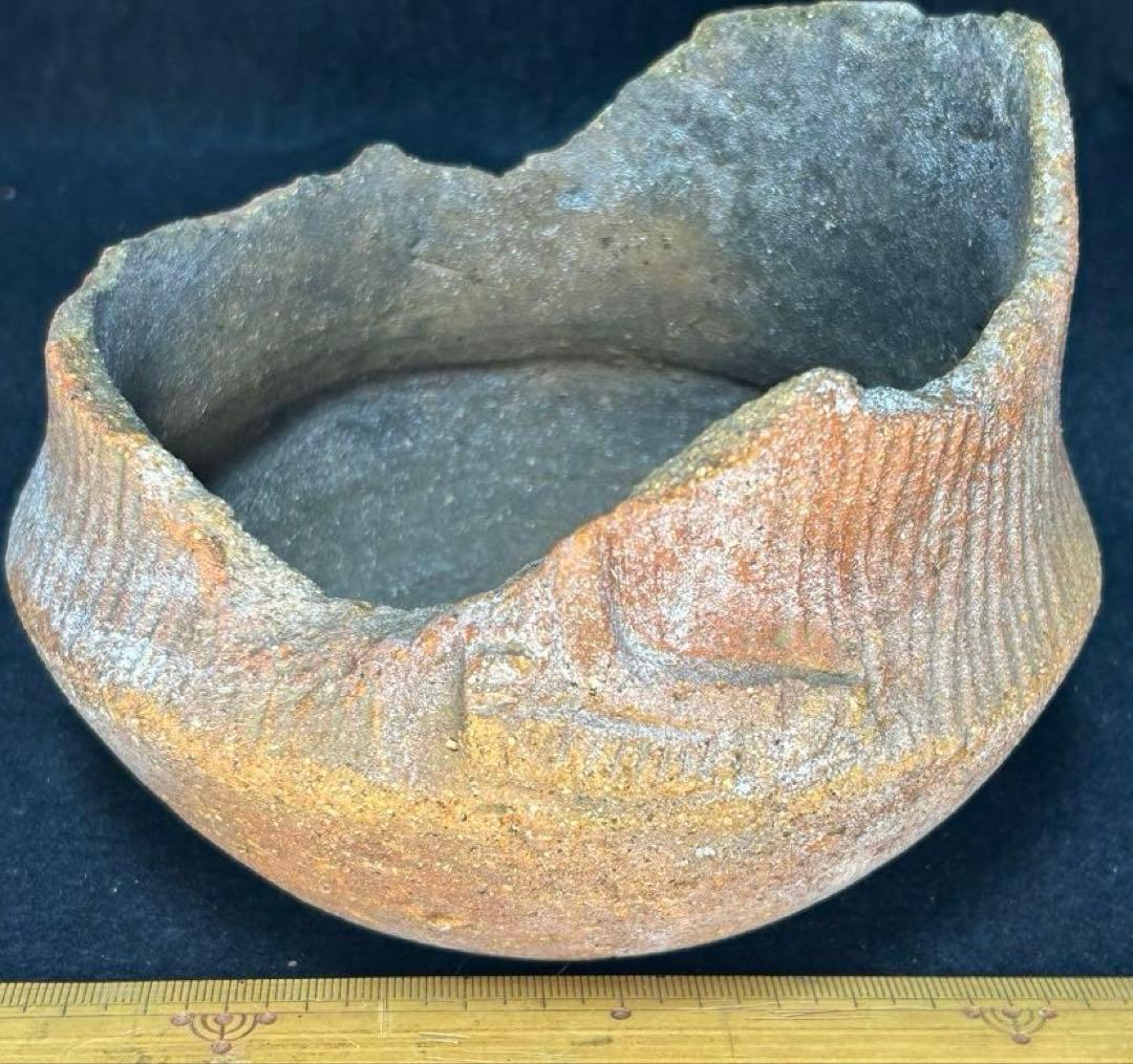 縄文土器　獣面把手と縄文土器底部