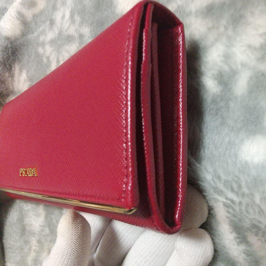 PRADA サフィアーノメタルラインレッド系 長財布