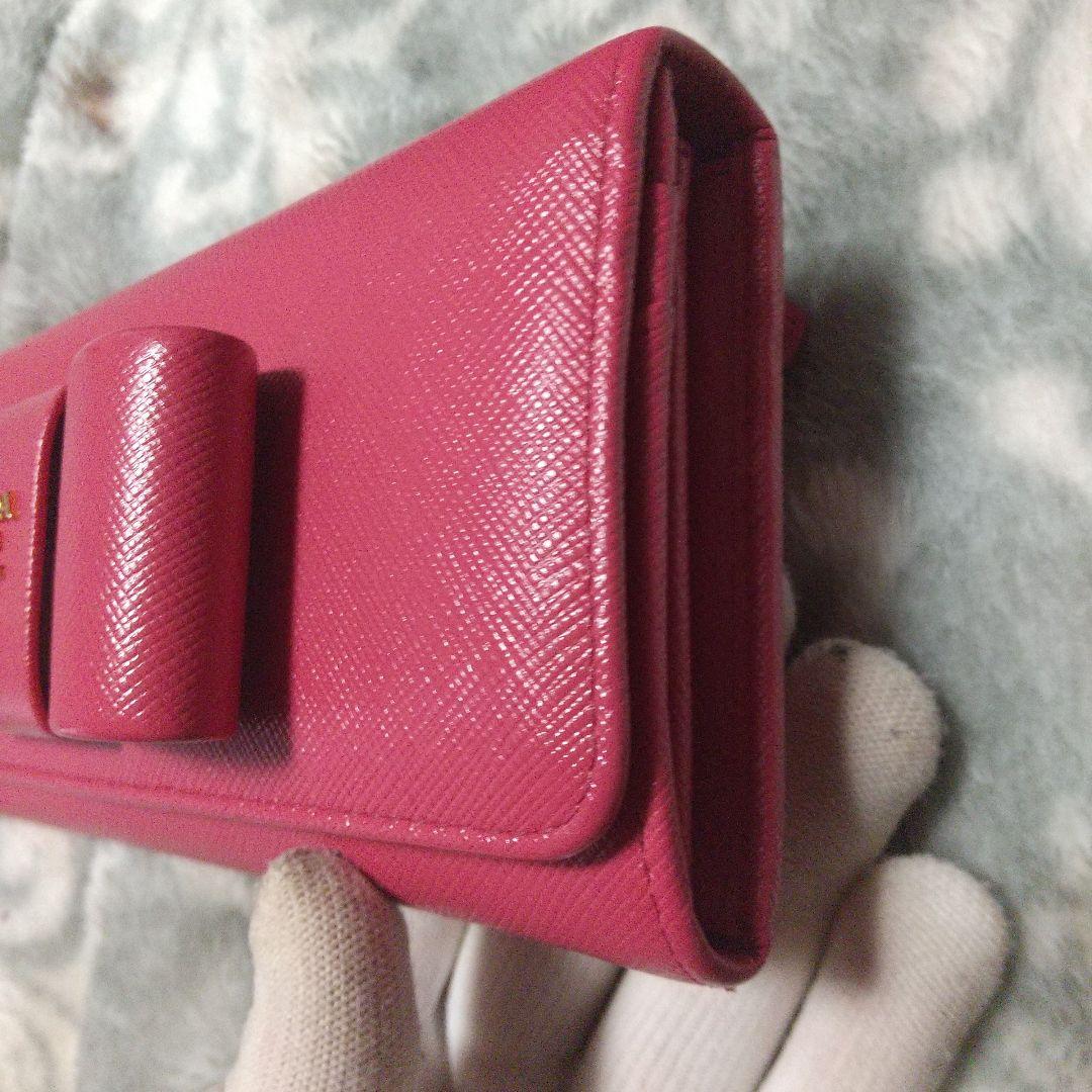 PRADAサフィアーノ レザーリボン付き 長財布 レッド系