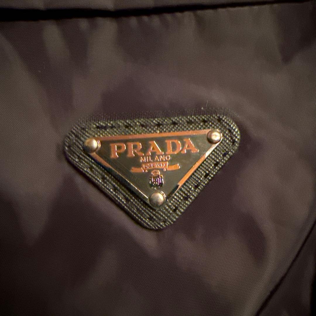 最終価格黒 ロゴ入りニットセーター ポケット付き