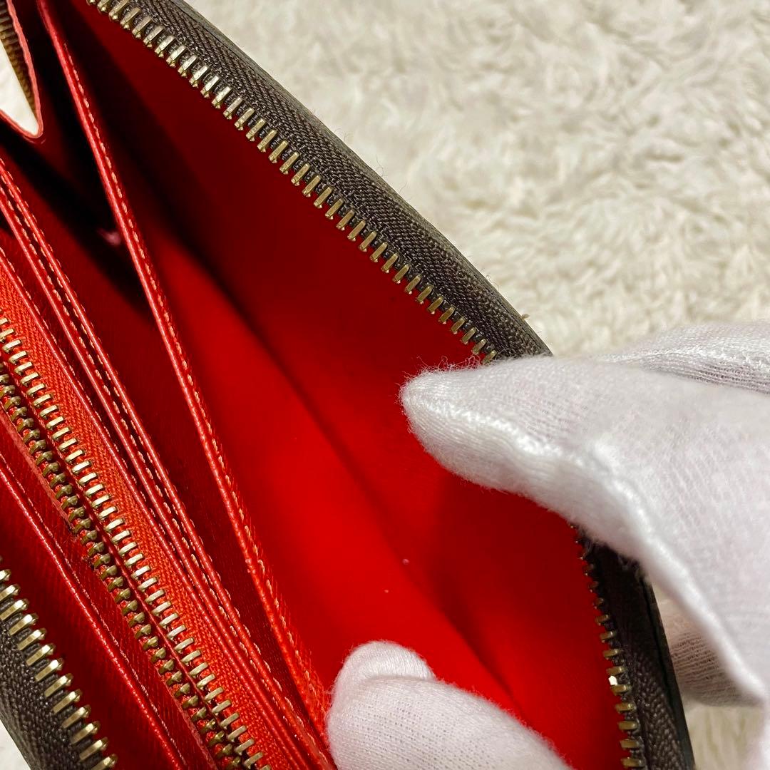 ルイヴィトン モノグラム ステッカー ジッピーウォレット コクリコ M62149