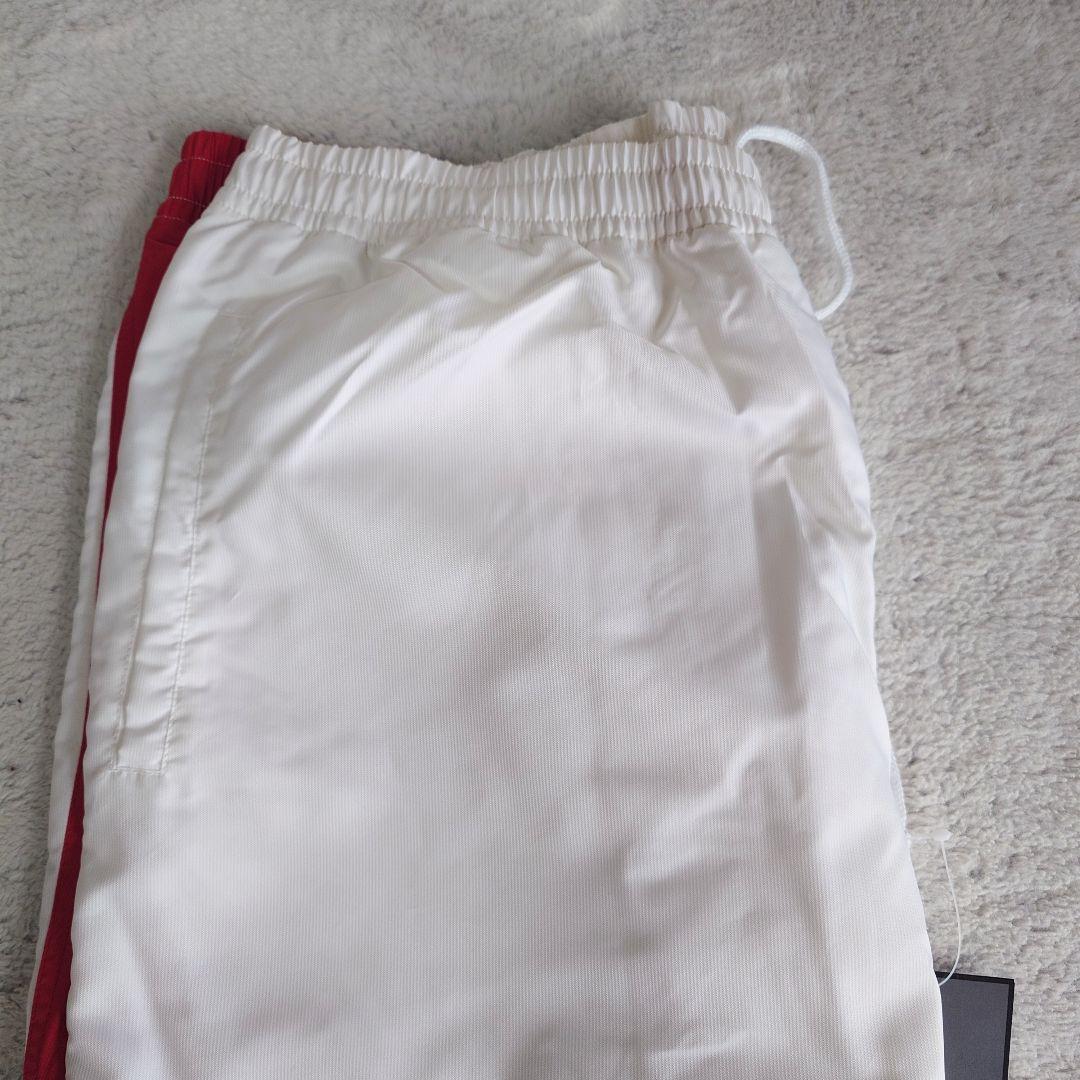 タグ付き SSK セットアップ ウインドブレーカー XOサイズ 白赤