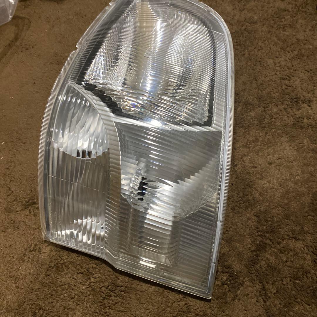 ハイゼットトラック　EBD-S211Pヘッドライト左