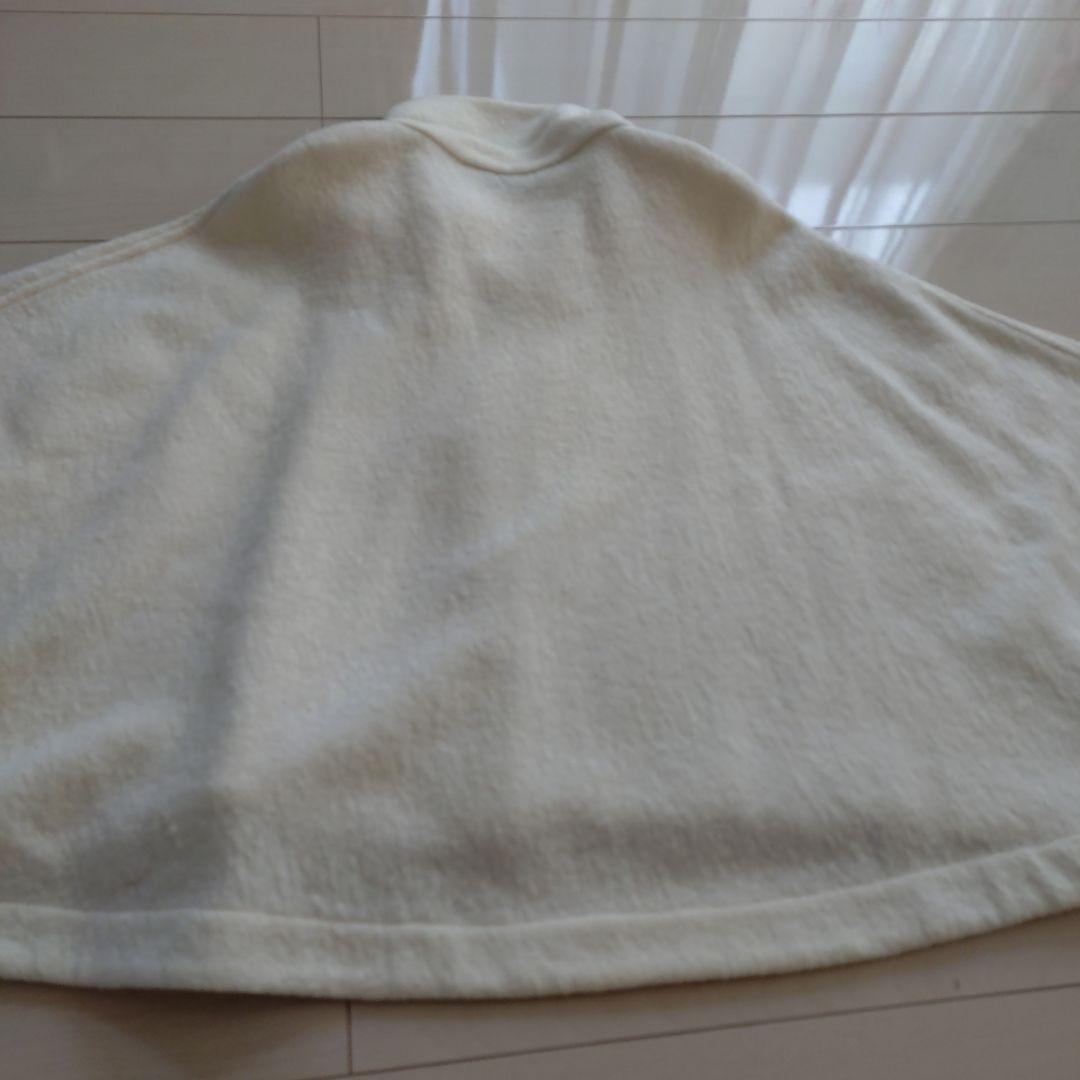 センソユニコ　モユル ホワイト ボタン付き ハイネック ポンチョ