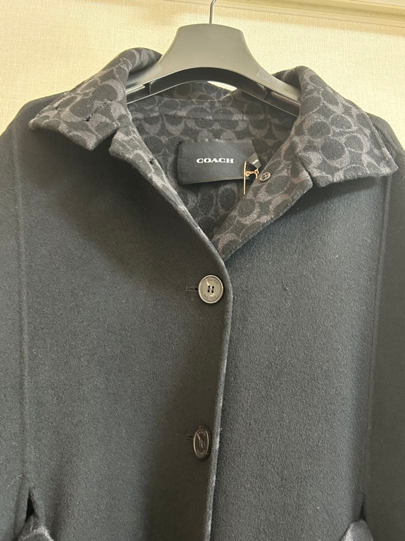 コーチ COACHケープコート ブラック 裏総柄　衣装カバー付　タグ付き　新品