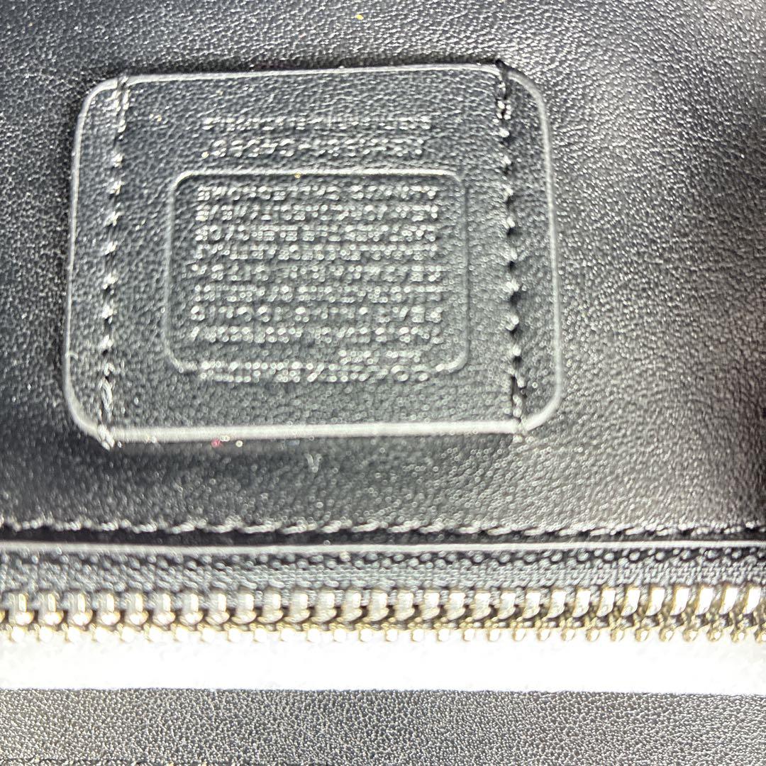 【未使用級】COACH×スヌーピー コラボ長財布 シグネチャー 保管袋付き