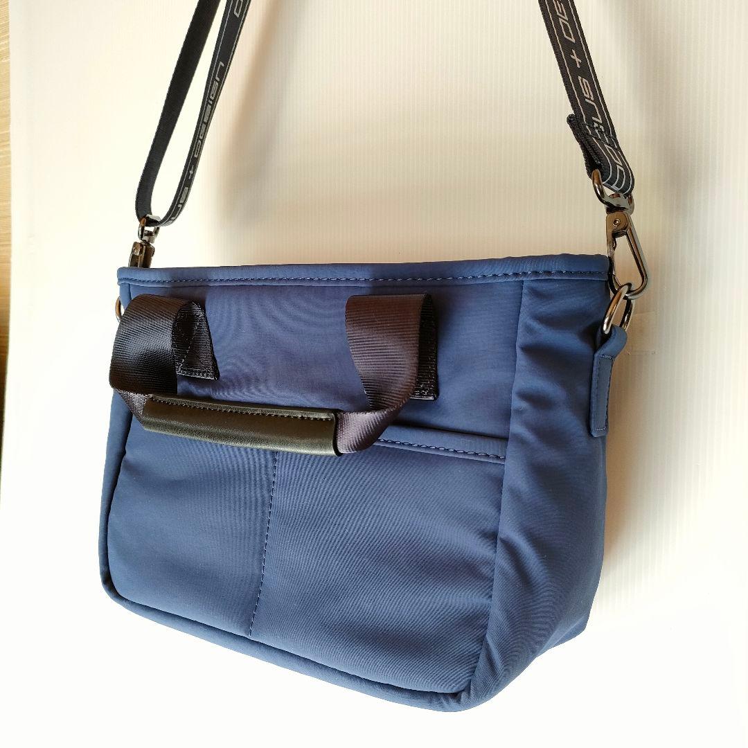 ☆新品未使用☆DOCUS ドゥーカス カートラウンドバックストラップ付ネイビー