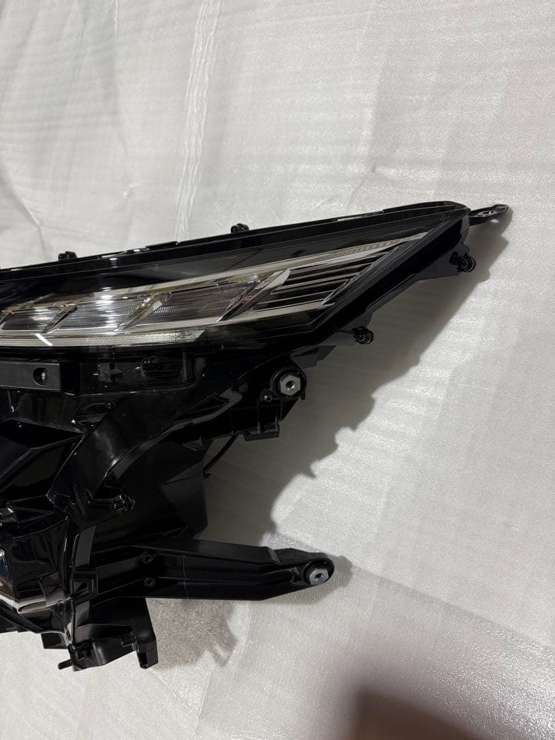 オートゾーン様用ヴォクシー純正ヘッドライト 左 補修歴なし