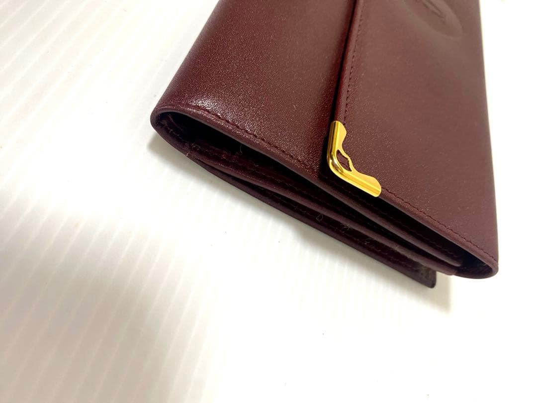 Cartier カルティエ　ボルドー　ワインレッド　長財布　三つ折り　未使用品