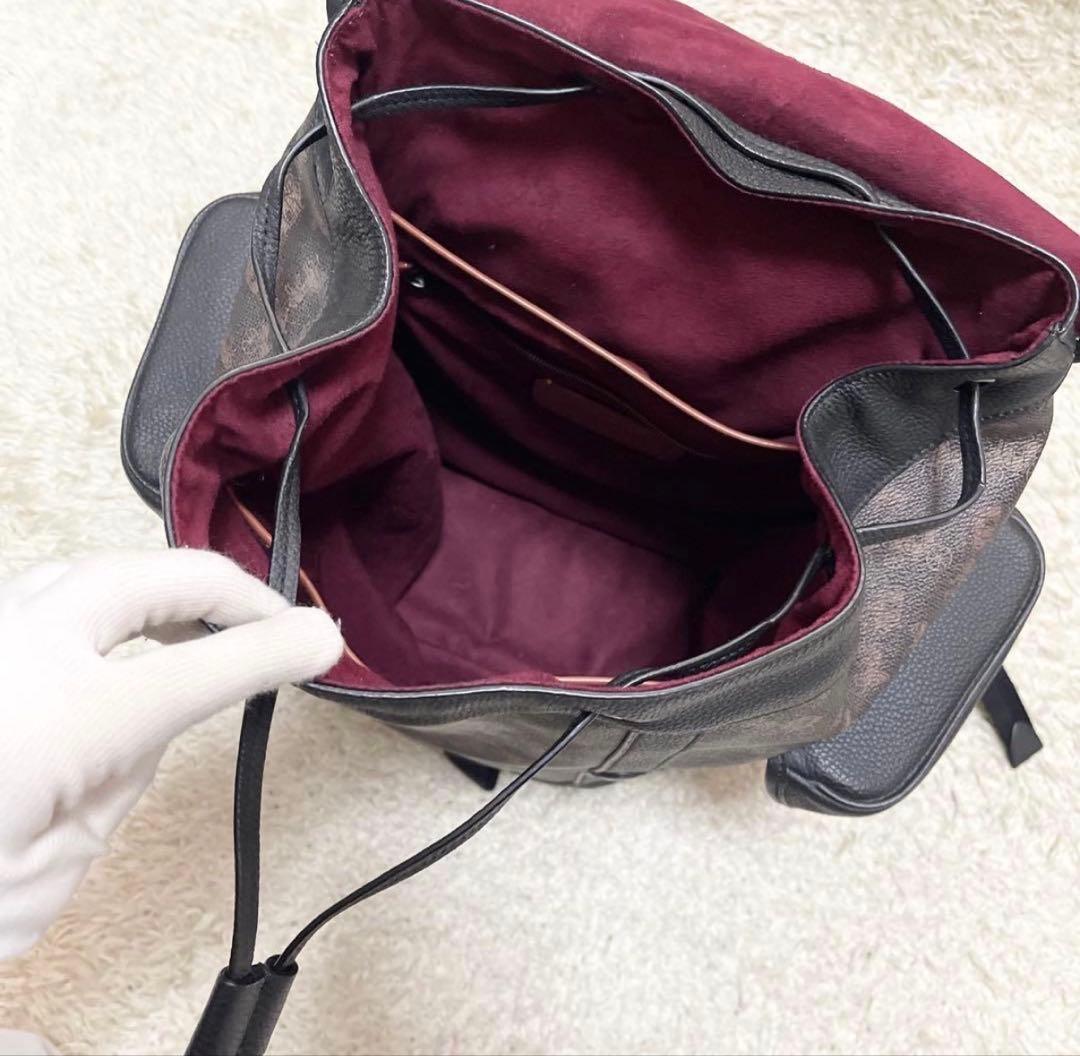 【美品/A4可】COACH 巾着　リュック　レザー　PVC　黒　馬車柄　ロゴ金具