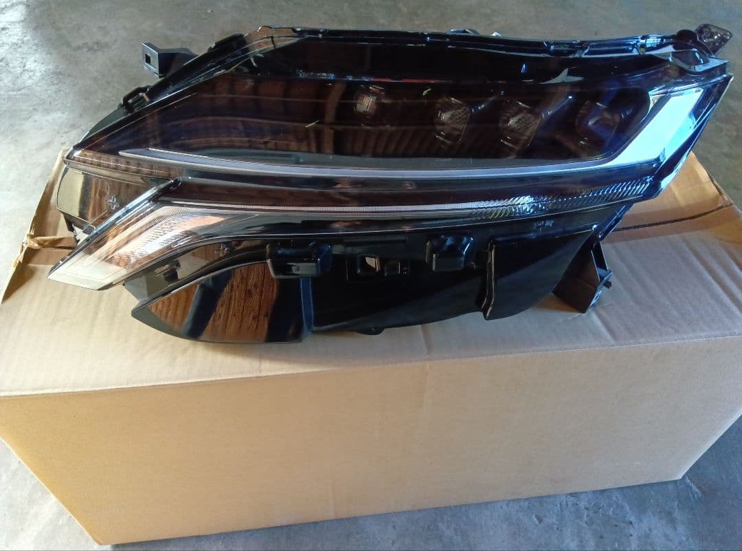 日産 ノート オーラ 純正 左ヘッドライト ICHIKOH 1994