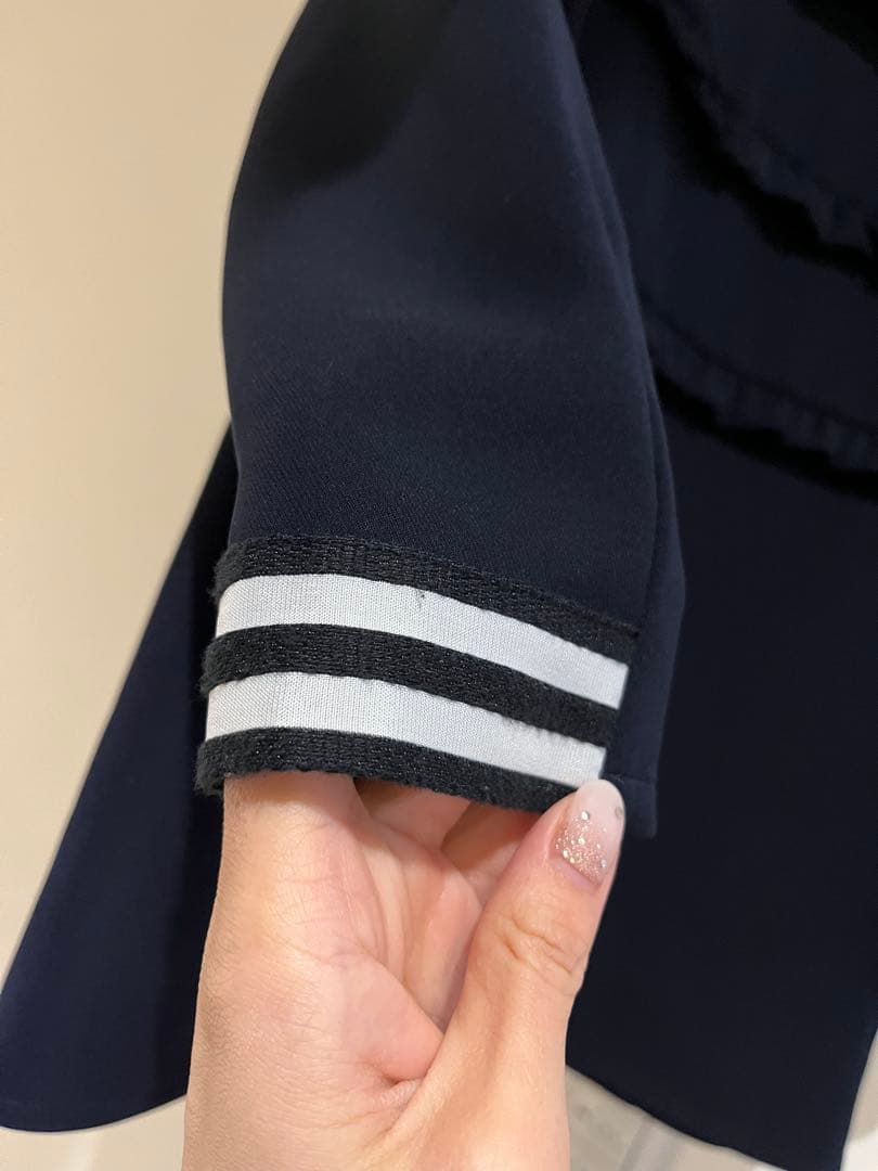 【ボーダーズアットバルコニー】ネイビーフリル長袖トップス