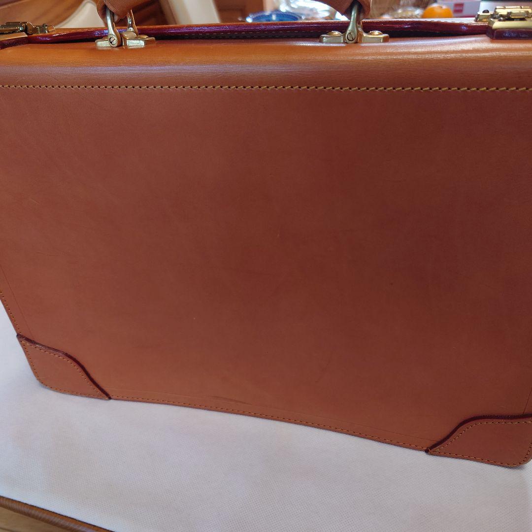 FIVEWOODSオレンジ レザービジネスバッグ（保管袋付き：PRADA）