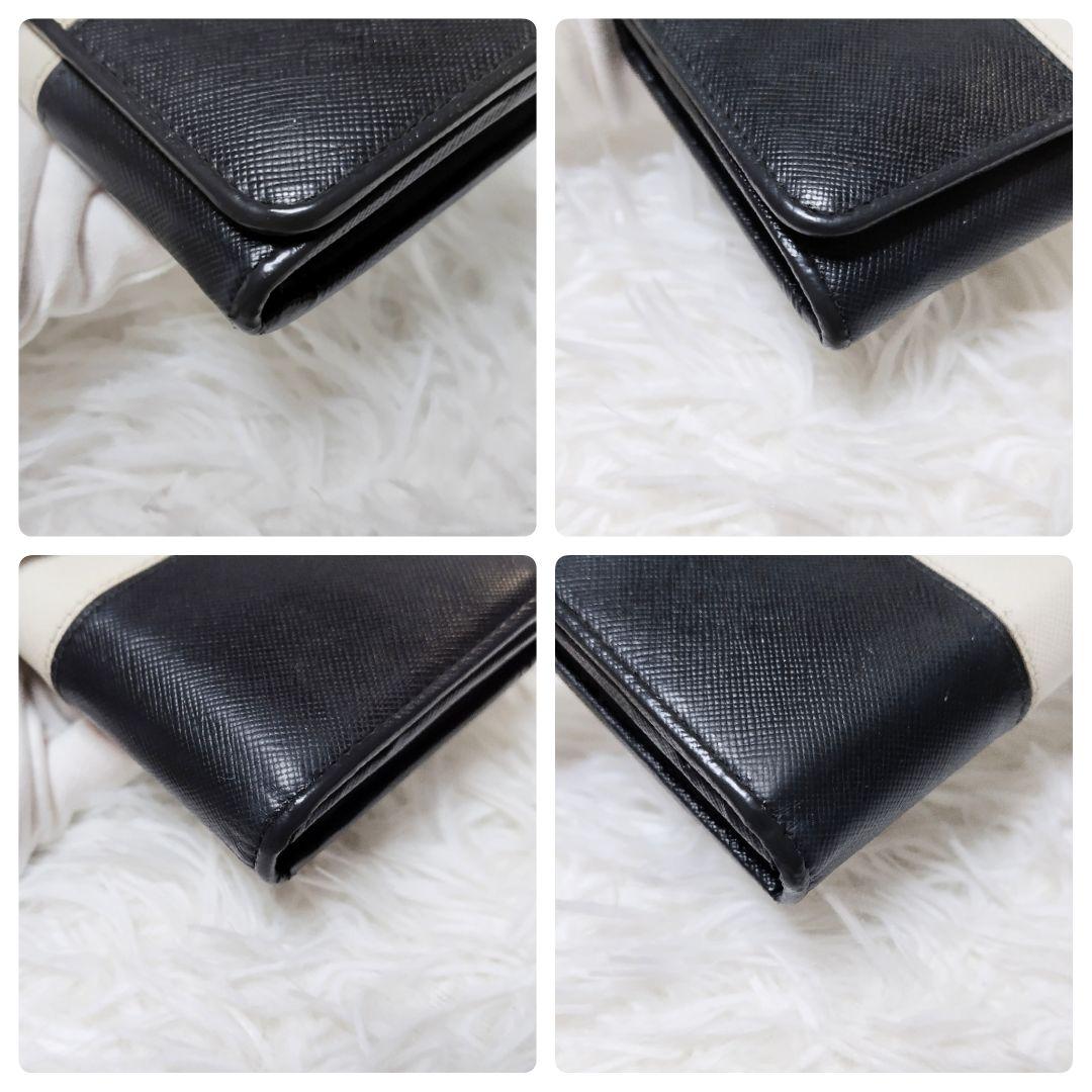 レア美品✨プラダ◇バイカラーブロッキングフラップ長財布　ゴールド金具白黒レザー