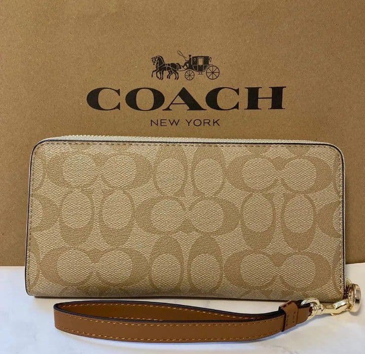 新品未使用コーチ長財布シグネチャーブラウンストラップ付きレディースメンズ送料無料