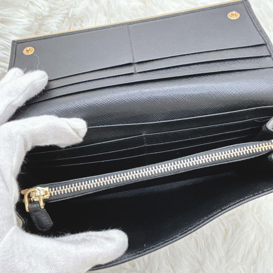 PRADA サフィアーノレザー フラップ 長財布 メタルロゴ ブラック