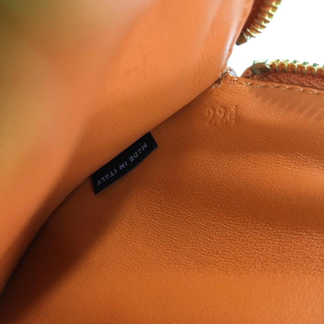 PRADA サフィアーノ ケース●オレンジ ラウンド 丸型 1M1443