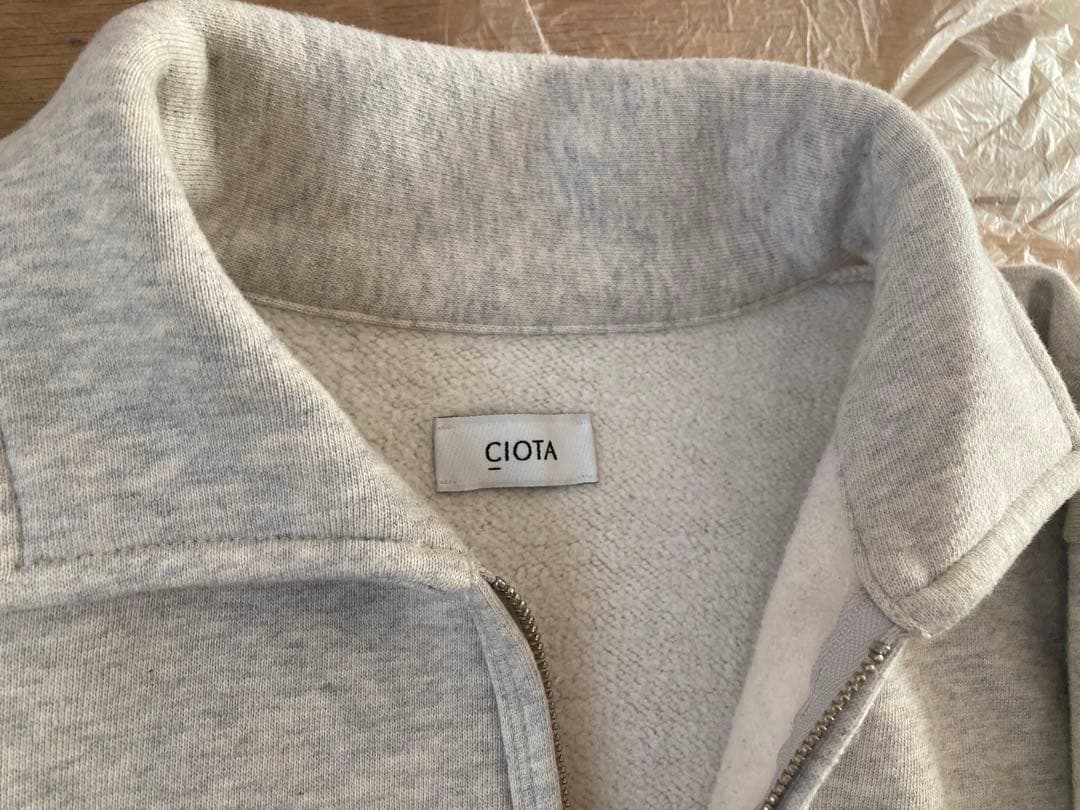 シオタ ハーフジップスウェットシャツ ユニセックス