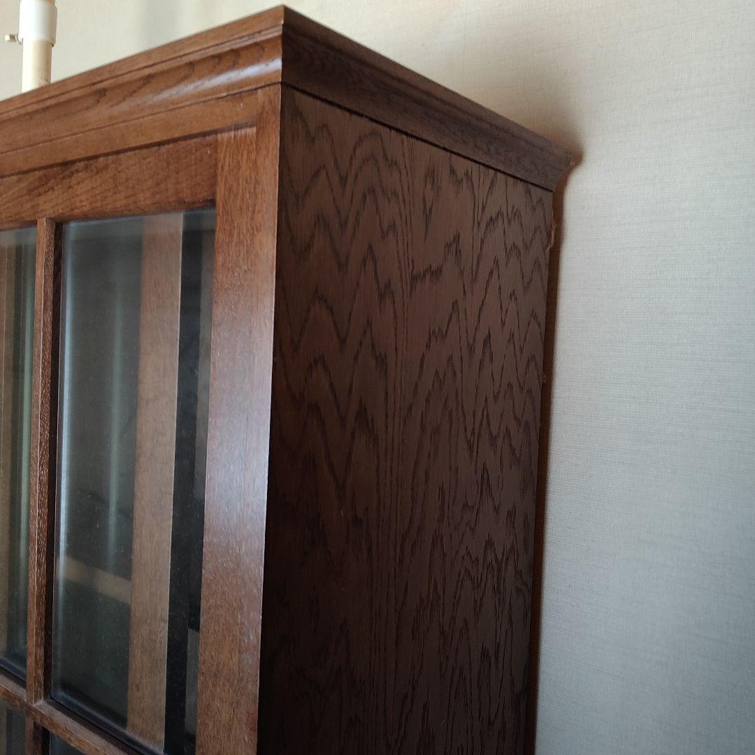 木製ブラウン良品本棚 ガラス扉、引き出し3つ付き中古