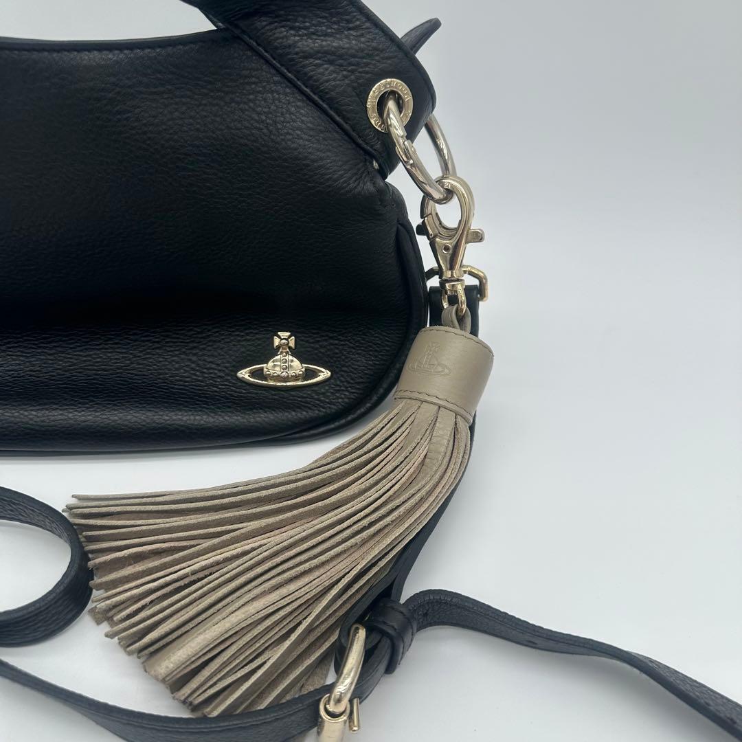 たま(=^_^=) Vivienne Westwood 黒レザー タッセル