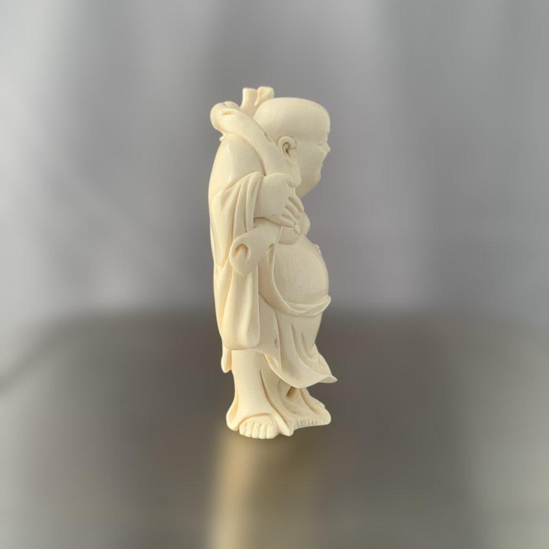 【詳細不明】時代物　置物　荷物を担ぐ太った男