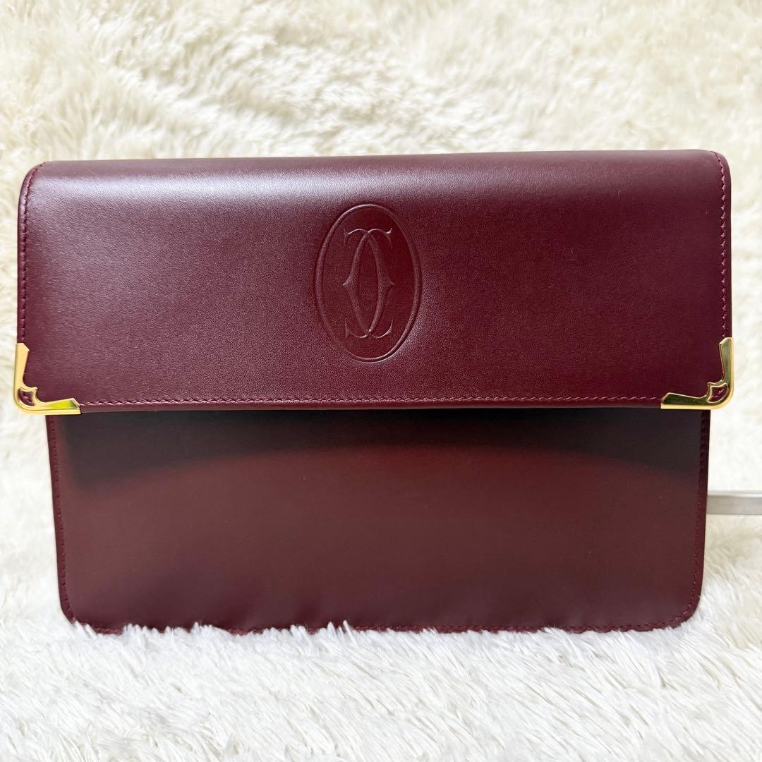カルティエ　Cariter　マストライン　クラッチバッグ　ボルドー　ロゴ金具