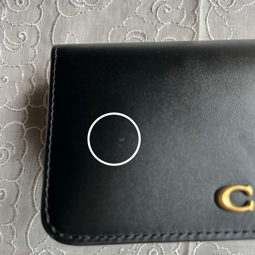 COACH 二つ折りミニ財布